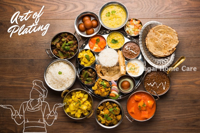 A beautifully arranged Indian thali with a variety of dishes, showcasing Kalaimagal Home Care's expertise in the art of plating and gourmet home cooking services in Coimbatore.