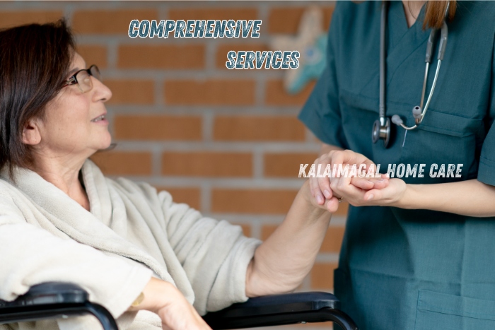 A compassionate caregiver in a green uniform holding the hand of an elderly woman in a wheelchair, illustrating the comprehensive services provided by Kalaimagal Home Care in Coimbatore. Our dedicated team ensures personalized and professional care for seniors, enhancing their quality of life at home