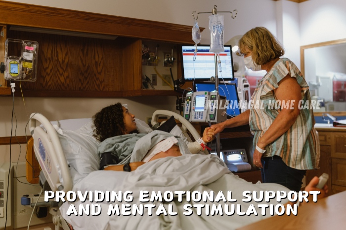 Caregiver offering emotional support to a patient in a hospital bed, emphasizing mental stimulation and comfort. Kalaimagal Home Care in Coimbatore provides in-home emotional support and mental stimulation services to aid recovery and enhance well-being