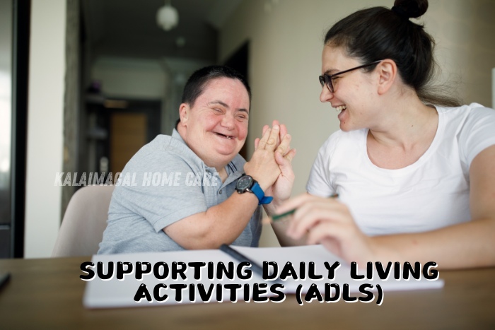 Caregiver joyfully assisting a person with special needs, supporting daily living activities (ADLs). Kalaimagal Home Care in Coimbatore specializes in providing compassionate support for individuals with disabilities, helping them with daily tasks and enhancing their quality of life